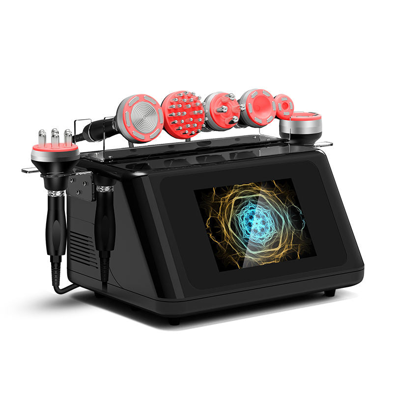 Black 7-in-1 body contouring machine with touchscreen display and seven interchangeable handpieces for cavitation, vacuum massage, and RF treatments.