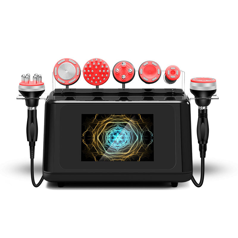 Professional 7-in-1 cavitation vacuum RF machine featuring an angled touchscreen with graphical treatment modes and handpiece selection.